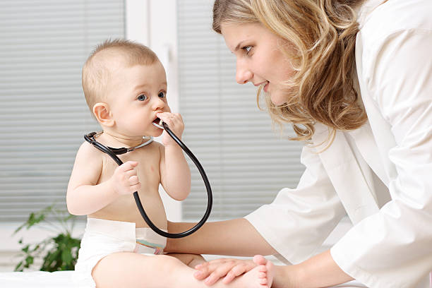 istock Doctor and baby friendship 172317527