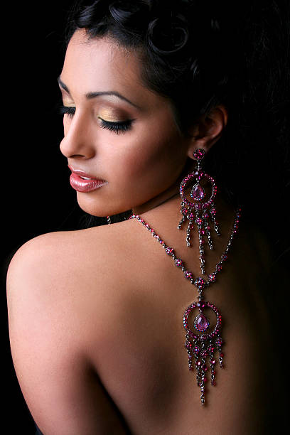 A beautiful woman shows off her luxury jewels.