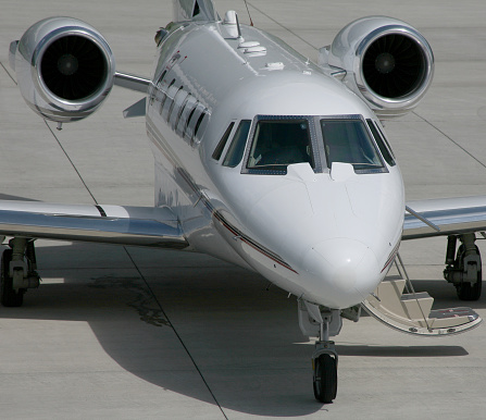 Private jet awaiting VIPs. Small business jet prepared for travel by VIPs and celebrities