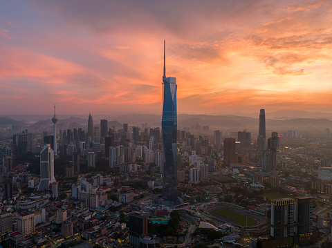 Aerial drone view of beautiful sunrise at Kuala Lumpur city skyline