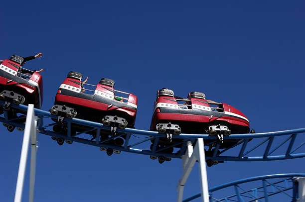 istock Low angle view of the underside of a red roller coaster. 172318480