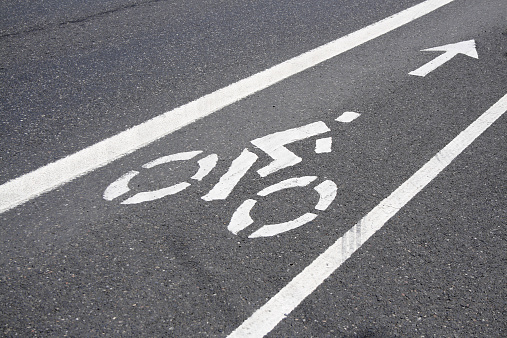 bike lane sign on a road