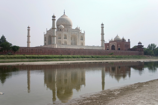 Magnificient monument built by Emperor Shah Jahan in memory of his loving wife Mumtaz Mahal. Riverside view taken after crossing the Yamuna River