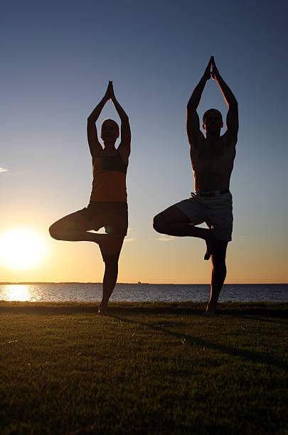 istock Man and Woman in Yoga Pose 172319954