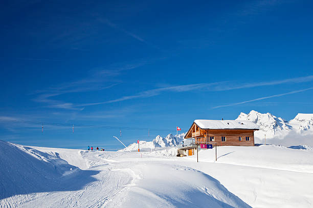 Chalet on Ski Piste stock photo