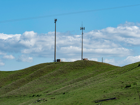 Telecom towers and green hills next to the Hume Dam near Tallangatta next to  Victorian High Country