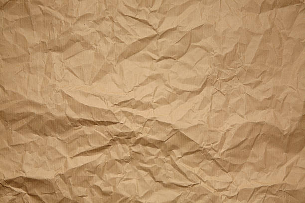 faltig brown paper - brown paper old horizontal stock-fotos und bilder