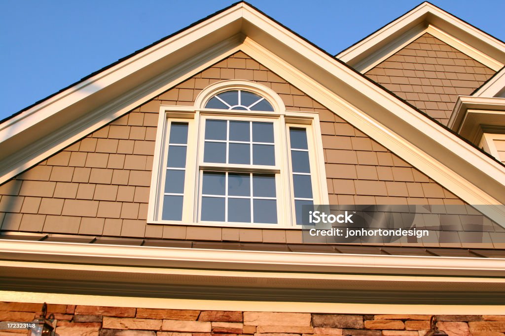 Real Estate - Second Story Window Second Floor Window on a fancy house. Architectural Feature Stock Photo