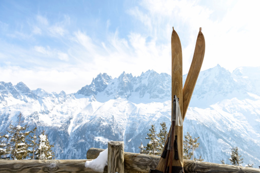 Vintage skis with Mont Blanc Massif behind