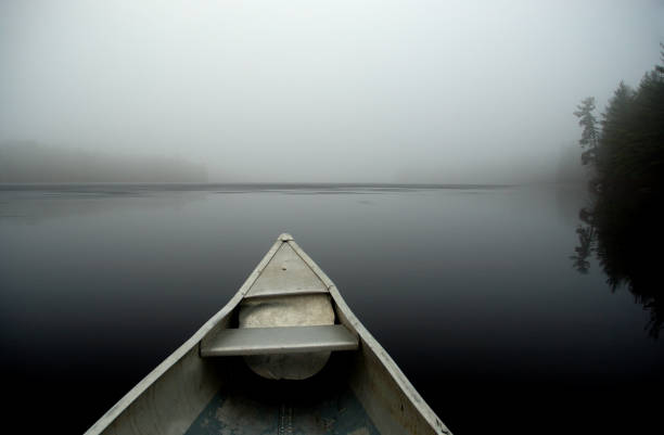 istock Canoe on a Misty Lake 172323330