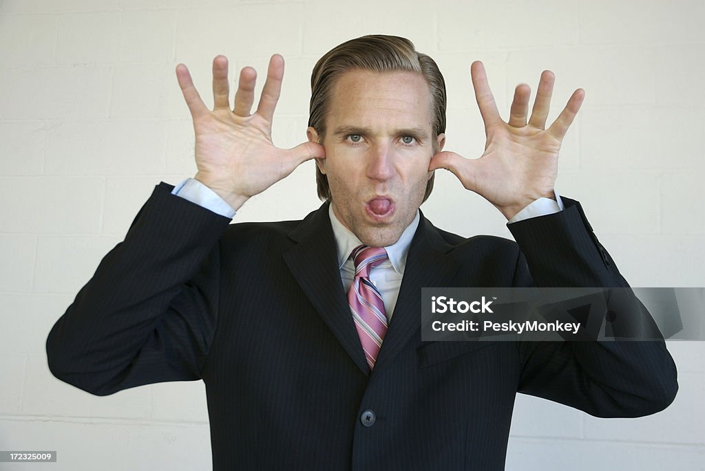 Empresario Sacando la Lengua Nyah-Nyah Nyah - Foto de stock de Actitud libre de derechos