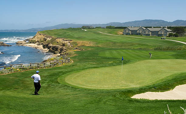 istock Man playing golf on luxury course along a rocky coastline 172325293