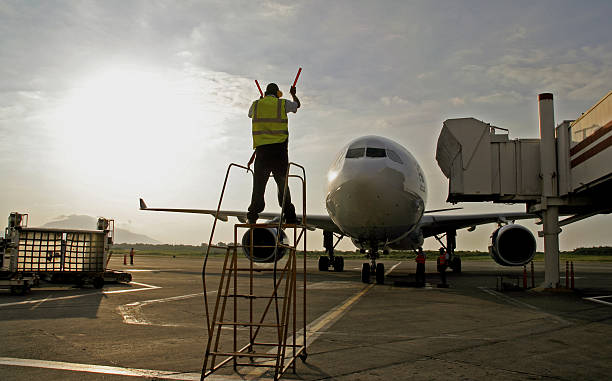 istock Aircraft Marshalled onto Stand 172325350