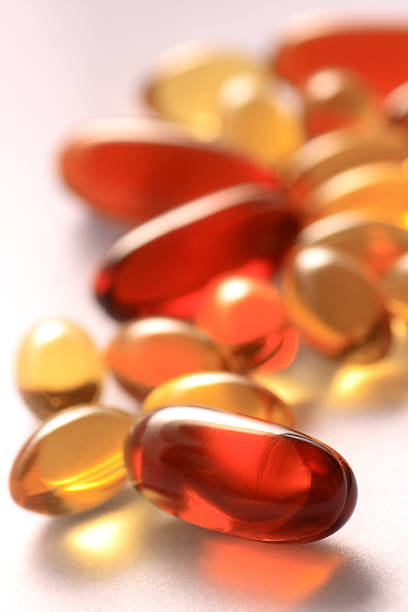 비타민 보충 젤 캡�슐의 - capsule vitamin pill red lecithin 뉴스 사진 이미지