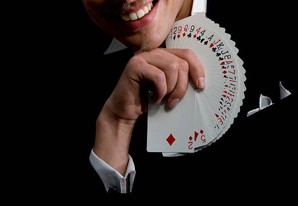 istock Magician with playing cards 172325474