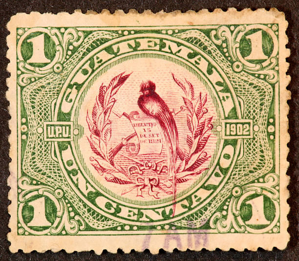 Guatemala postage stamp 1902 1902 Guatemala stamp with resplendant quetzal. puerto quetzal guatemala stock pictures, royalty-free photos & images