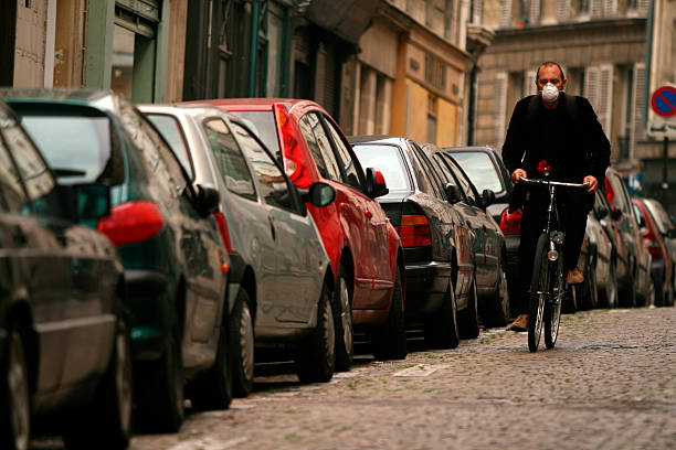 A cyclist in a parisian street