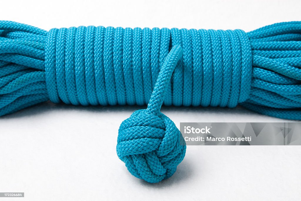 Альпинистской веревке пружинка - Стоковые фото Кулак роялти-фри