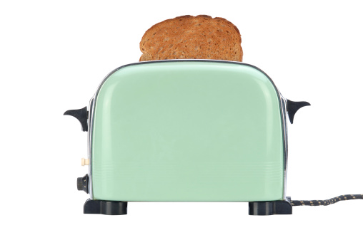 Vintage Green and Chrome Toaster with Toast. Clipping Path Included.