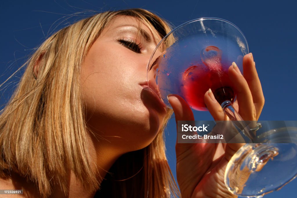 Drinking Drinking a cocktail Cocktail Stock Photo