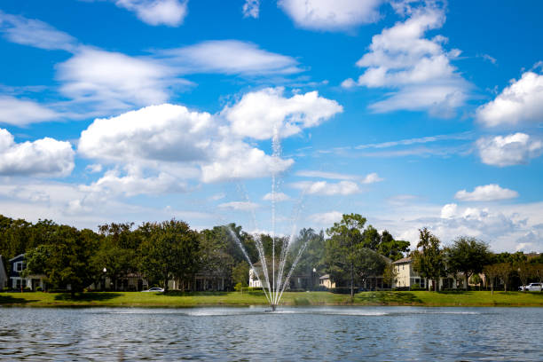 istock Fountain in lake in subdivision 1723269441