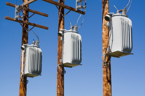 High voltage electric transformer equipment for sending electrical energy over power line cables for electricity generation and supplying distribution in Minnesota, USA