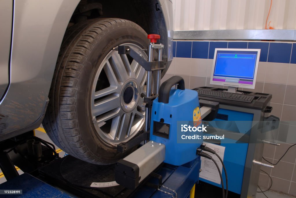 wheel alignment and balancing with computer  Accuracy Stock Photo