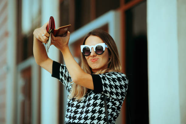 istock Rich Woman Throwing Money from her Wallet 1723285787