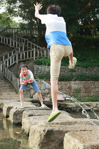 happy child playing in the water