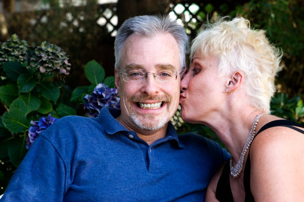 istock Active Older Senior Couple Kissing on Cheek, Copy Space 172329608