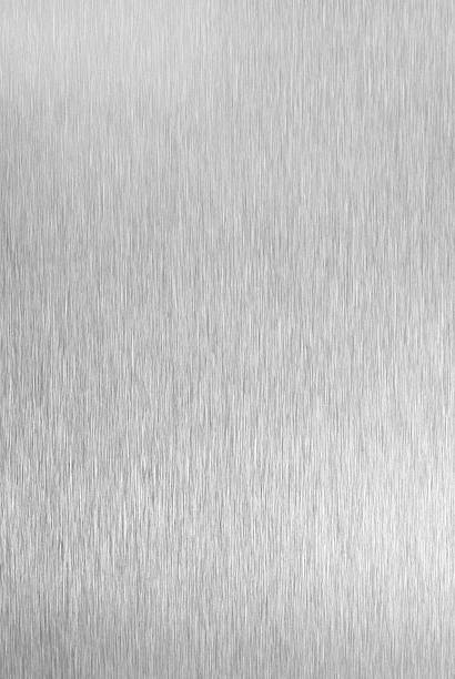 Brushed metal abstract background Photograph of real brushed metal surface - not a photoshop effect. award plaque stock pictures, royalty-free photos & images