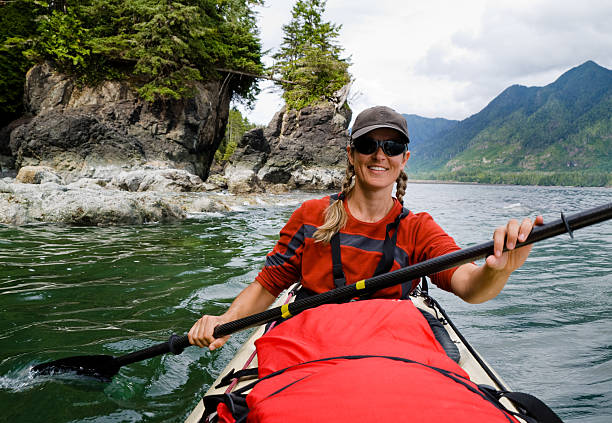 Woman Kayaking in Canada stock photo