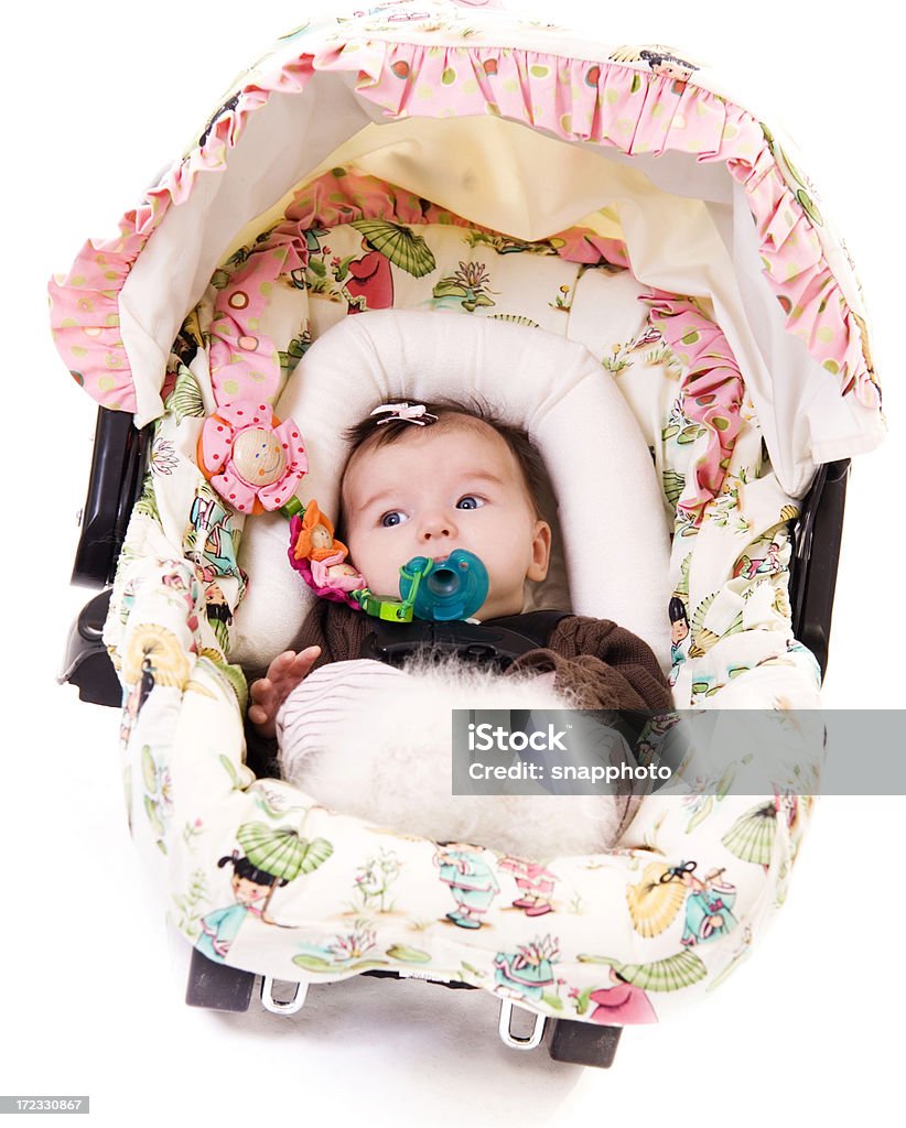 Ready to Go a baby in a car seat. Baby - Human Age Stock Photo
