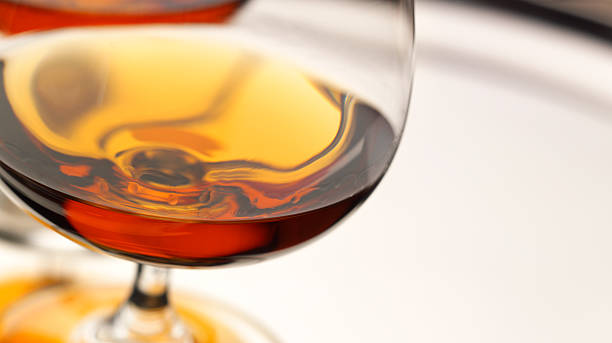 Brandy Snifter Close up of Brandy Snifter on silver tray cognac region photos stock pictures, royalty-free photos & images