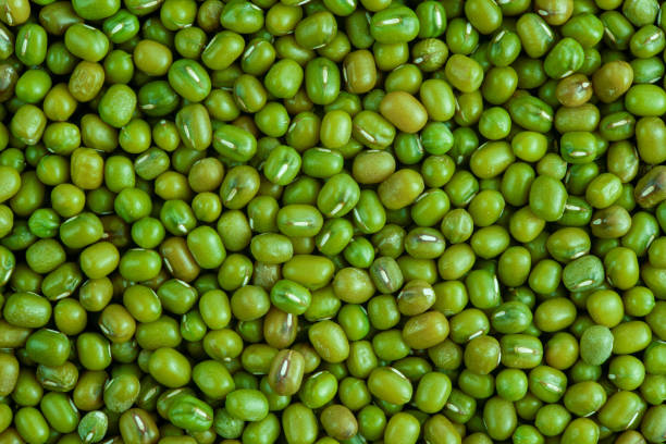 istock Close up edamame and green pea beans 1723318084