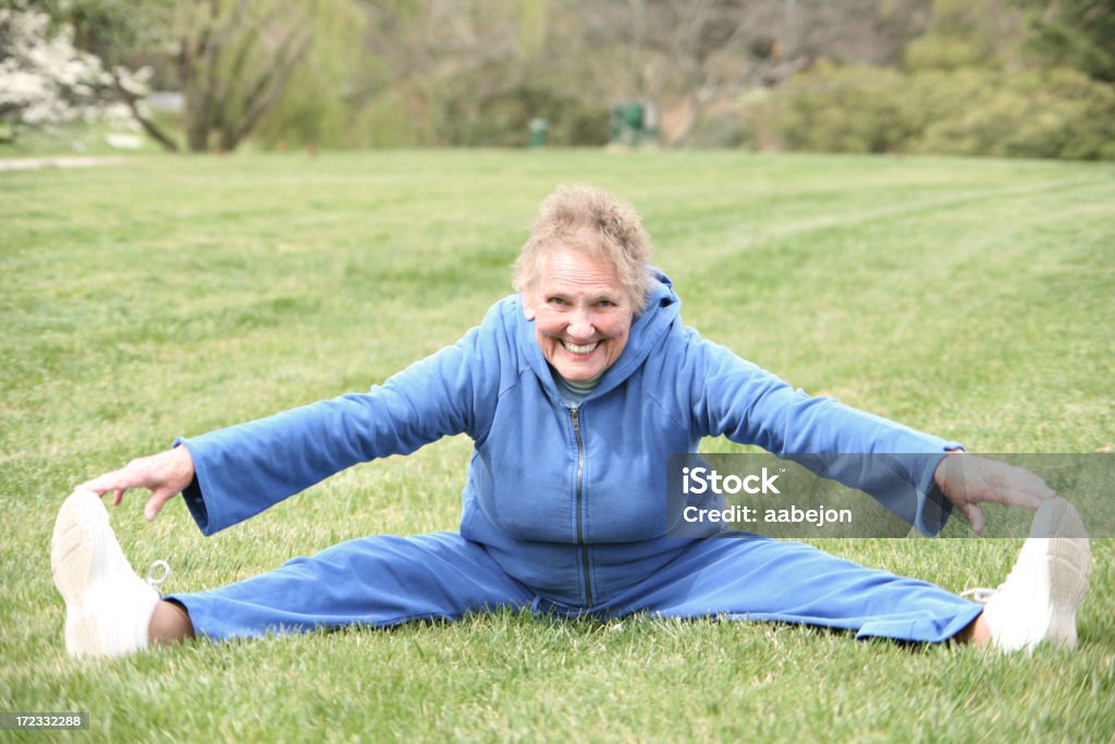 Splits Senior Woman Staying Fit. Please view all pictures of this Doing the Splits Stock Photo