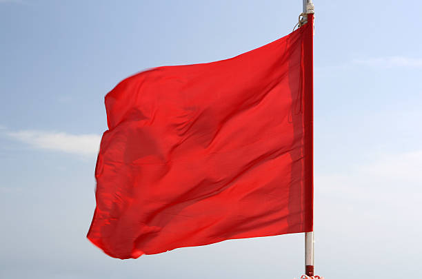 istock Red flag on the beach in Italy 172332390