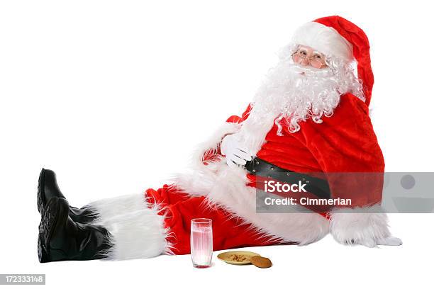 Overeaten Santa En Blanco Foto de stock y más banco de imágenes de Papá Noel - Papá Noel, Sentado, Comer demasiado