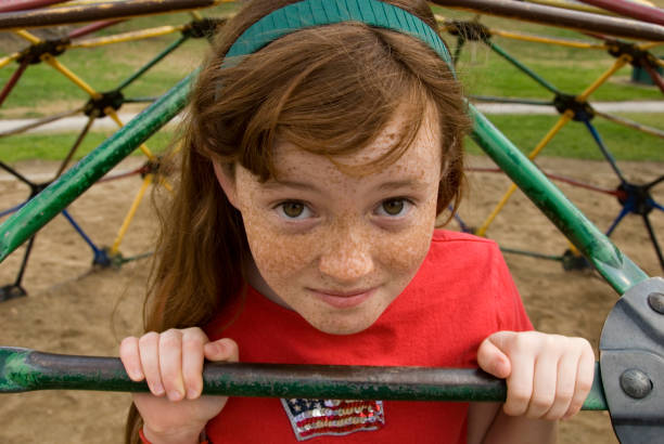 istock Defiant Redhead Girl on School Playground 172333271
