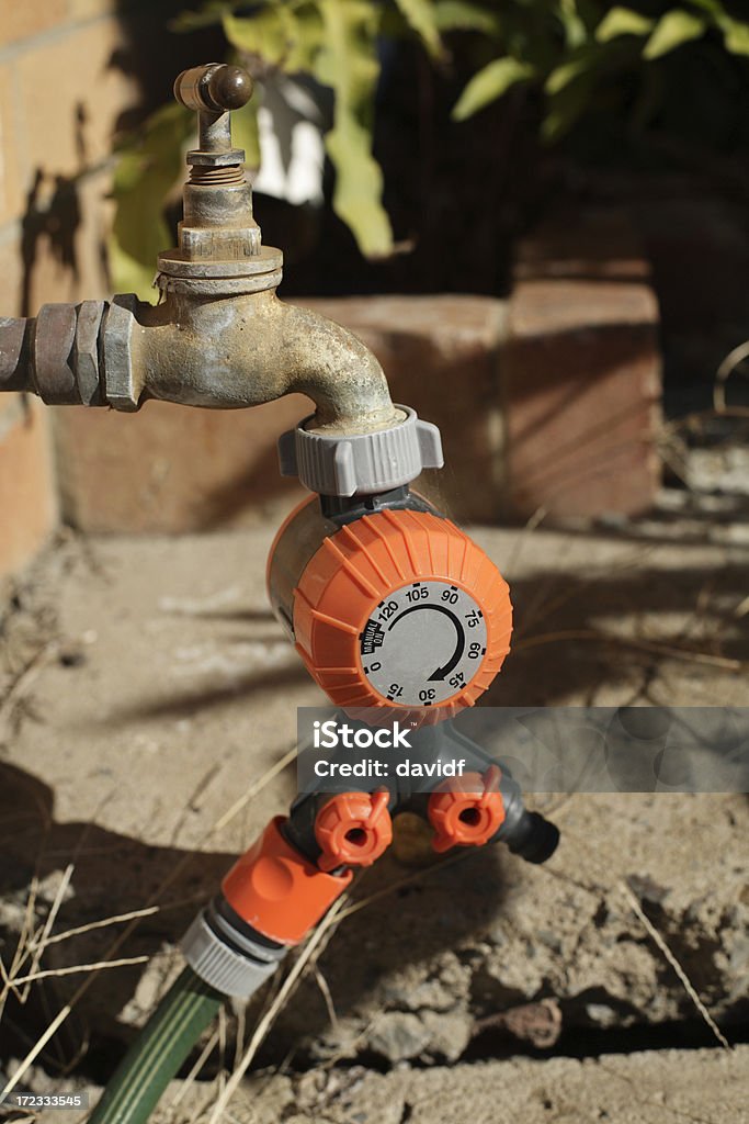 Water Tap Water tap with timer for water conservation Timer Stock Photo