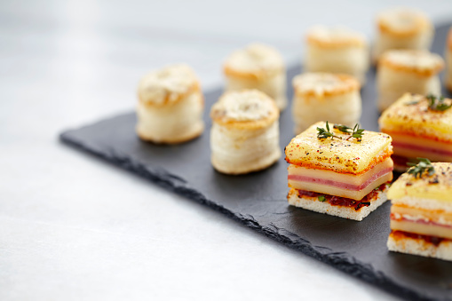 Close up view of canapes on granite tray