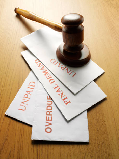 istock Unpaid Bills with Envelopes a Gavel and Mallet 172333749