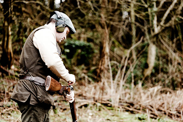 Man Loading Rifle 360+ Man Loading A Shotgun Stock Photos, Pictures & Royalty-Free Images ...
