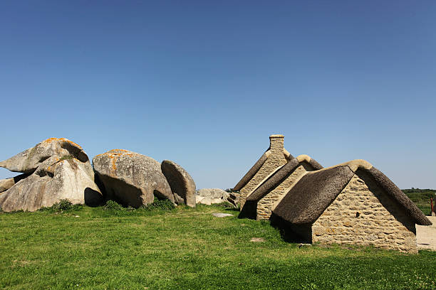 Thatch-roofed stone huts in Brittany, France