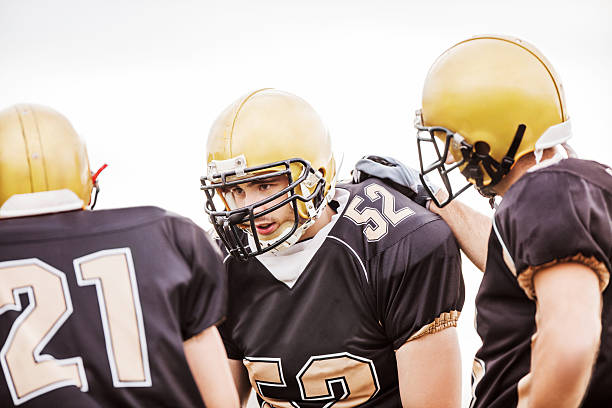 istock American football players making a plan. 172334151