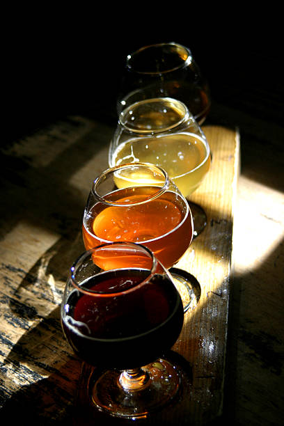 beer sampler on wood table stock photo