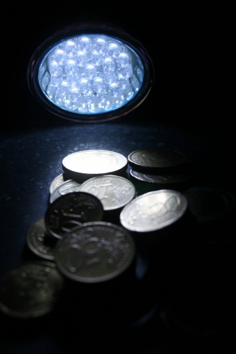 LED Light lights up coins