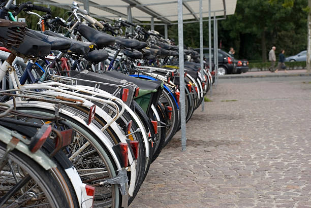 自転車の列 - bicycle rack bicycle parking community ストックフォトと画像