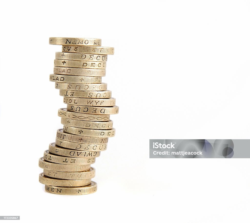 Stack of British pound sterling coins on a white background British pound coin sterling isolated on white background One Pound Coin Stock Photo