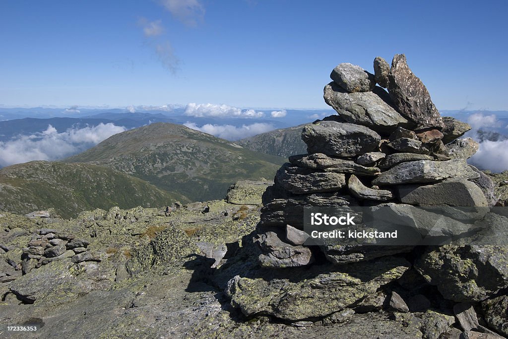 White Mountains National Forest (US) Cairn signifies the trail on an alpine hike. Cairn is on Mount Washington, looking toward Mount Clay, White Mountain National Forest, NH. Rock Cairn Stock Photo